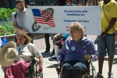 Karen Schneiderman and David Hockenberry lead the march
