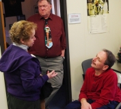 Mike Kennedy, MWCIL Board member, talks to a friend while Bob thinks about life.