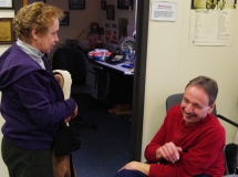 Mike Kennedy, a MWCIL Board member, and a friend laugh.