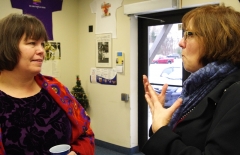 Julie and Mary Anne Padien from Karen Spilka's office talk.