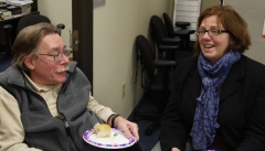 Executive Director, Paul Spooner chats with Mary Anne Padien from Karen Spilka's office.