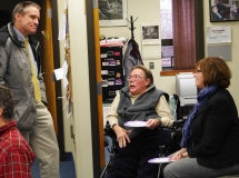 Executive Director Paul Spooner speaks with a Framingham engineer and Mary Anne Padien about the accessible ramps being added to the Memorial building.