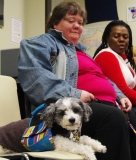 Lori and her service dog, Shivers, enjoy the party!