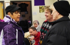 Jini speaks with Pam and Peggy.