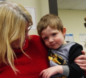 Pat holds her grandson, Mason.