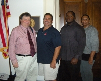 Steve Higgins,Director of IA, David Correia of MWCIL, William Wells and Lorrie Monteiro from IACIL pose outside Senator Kerry's office in the Capital.