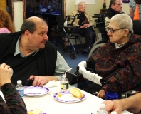 Joe Bellil, MWCIL Board President and V.P. at Easter Seals, talks to Disability Activist, Sybil Feldman