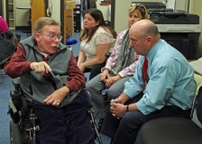 Paul Spooner, Executive Director of MWCIL, talks to Ed Carr of the MWRTA