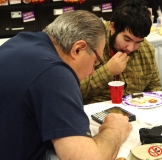 Joe and Ben talk using Ben's device