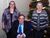 Wini McGraw of IA, Margaret Spooner, and Paul Spooner, Executive Director of MWCIL