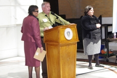 Bill Allan, of the Disability Policy Consortium, introduces Gayle Johnson of Cambridge