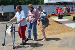 people walking near the beach