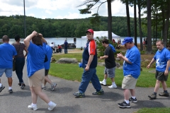 group walking to pond