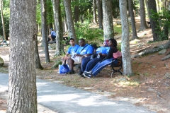 people in the shade