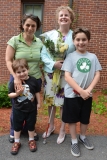 Jini with her daughter-in-law and grandchildren