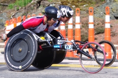 Men's Wheelchair - 2nd place on right - Ernst Van Dyk with 1:27:12, 3rd place on left - Kota Hokinoue 1:27:13