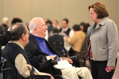 MRC Commissioner Charlie Carr (l) and former Commissioner Elmer Bartels with Rosalie Edes of Disability Policy and Programs