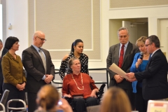 MetroWest legislators present Liz Casey with a citation