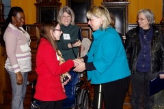 Amy and State Senator Karen Spilka. Kay, Pat and Bonnie look on.