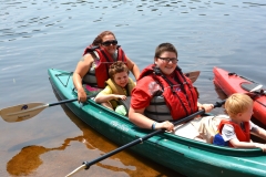 family in kayak