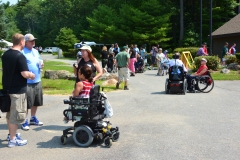 view of the sidewalk with lots of people