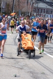 Chris Benyo of Illinois pushing wheelchair