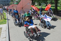 Disability Pride - several marchers in wheelchairs