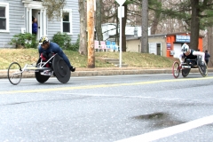 Two wheelchair racers