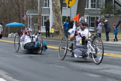 two handcycle racers