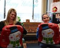 Ashley and Jess in their finely decorated office.