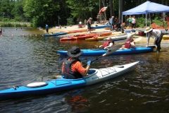 kayaker approaching the beach