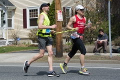 runner with guide - both holding a strap