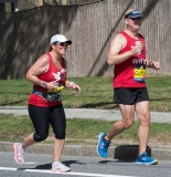 woman racer with guide