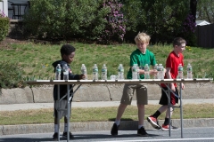 boys setting up water bottles