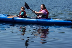 A woman and girl in a kayak