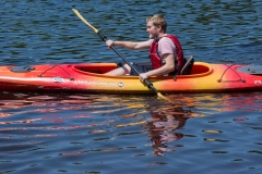 A young man in a kayak