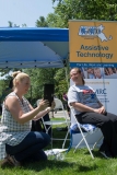 Two people at the MassMatch booth