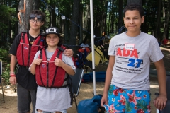 Two kids ready to go kayaking.