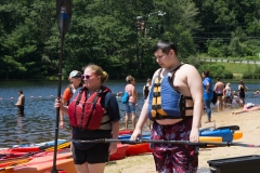 woman and boy ready to kayak