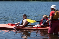 boy and woman in kayak