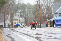 Front photo of man racing in wheelchair