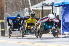 Photo of 3 wheelchair racers