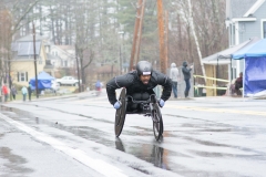 wheelchair racer coming up the hill
