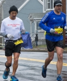 Photo of Early start racer Kevin Rhinehart from Idaho wearing a teeshirt that says "Stroke Survivors Can!" and his guide. Kevin finished in 5 hours and 38 minutes!