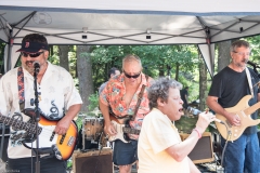 woman sings along with ATTIK band