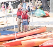 Couple gets ready to kayak