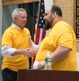 Michael Moloney congratulates Marc Bourassa of Berkshire County Arc