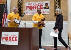 Michael Moloney and Michael Weeks have bear for Senator Cindy Friedman
