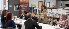 Several people talking at a table