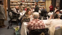 several people socializing at tables